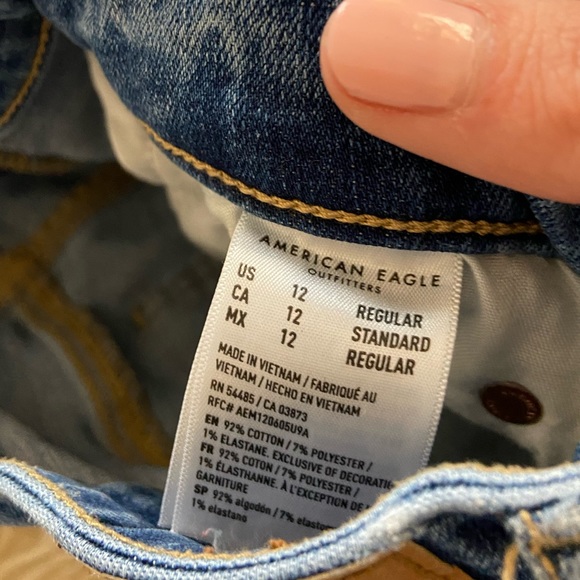 American Eagle Super Hi-Rise Flare Medium Wash Distressed Jeans, size 12 - Picture 8 of 11